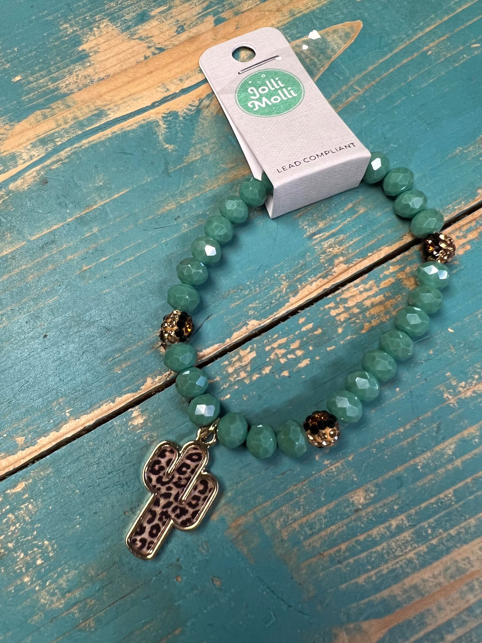 Turquoise bead bracelet with leopard cactus charm