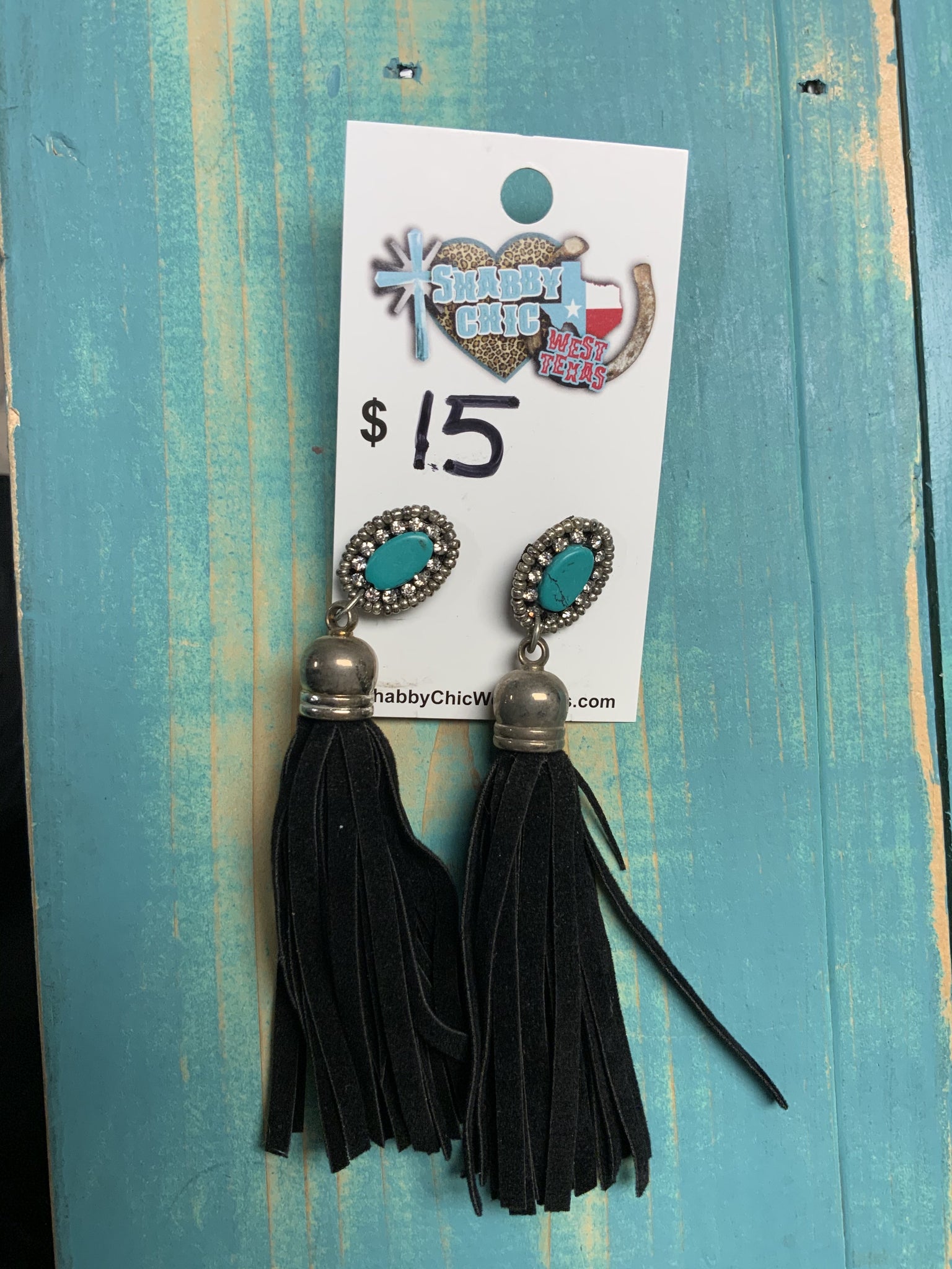 Large black tassel earrings with turquoise stones