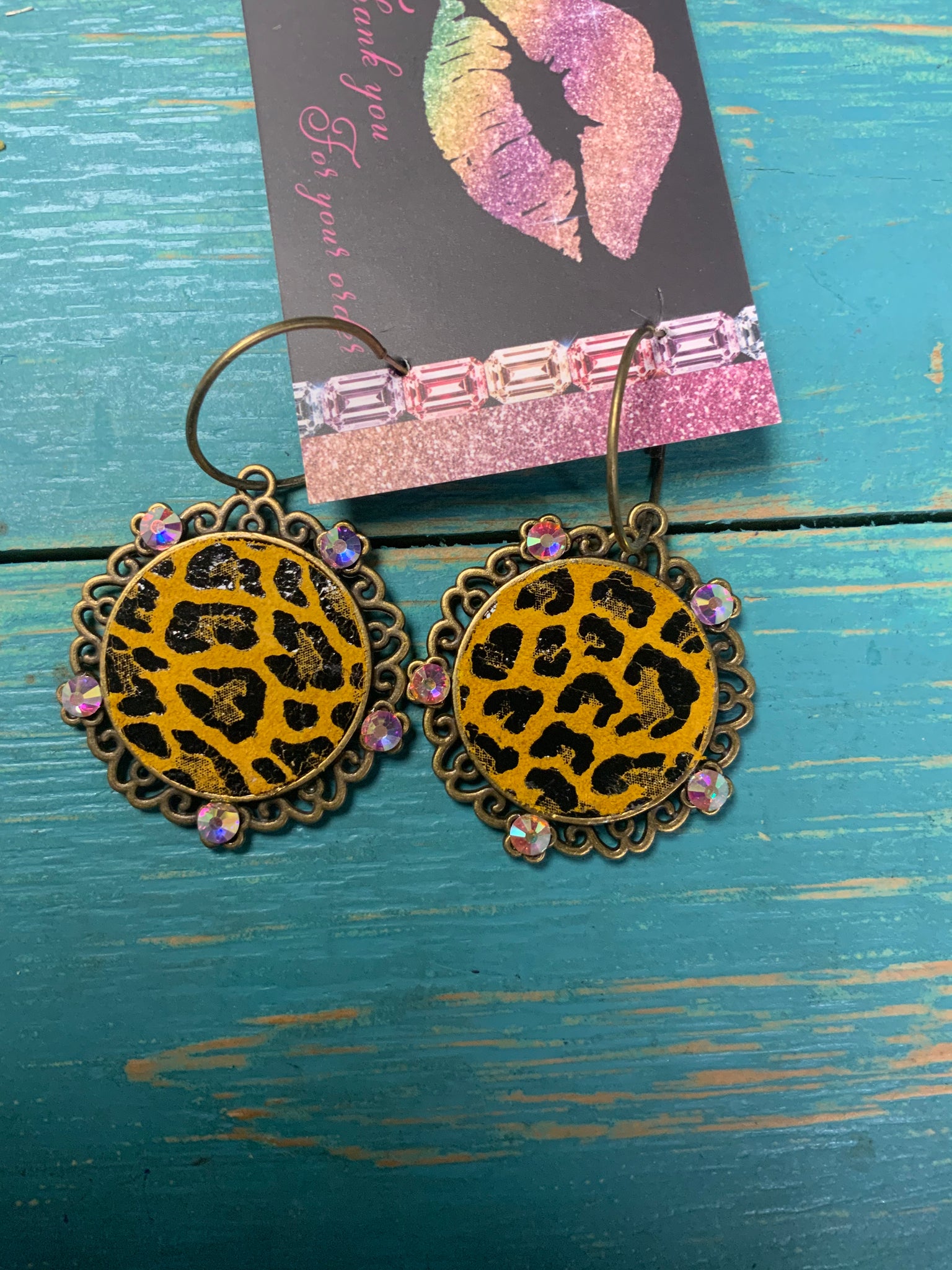 Round dangle metal cheetah earrings