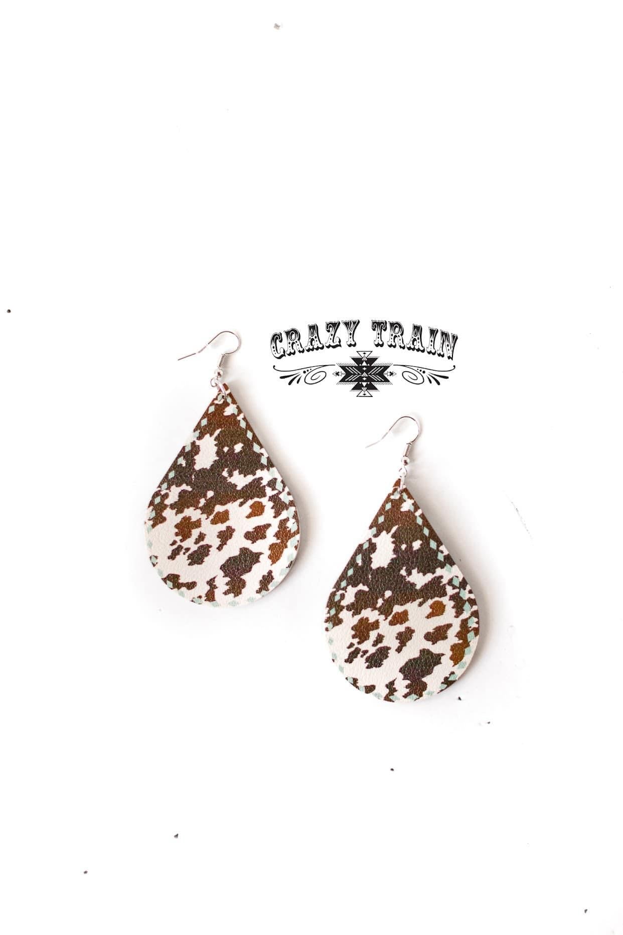 Crazy train longhorn Lady Earrings and Cowhide